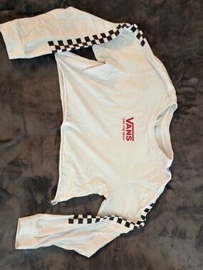 Vans White Cropped Long Sleeve Tee with Black Checkerboard Sleeves and Red Logo